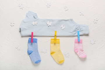 Stylish baby clothes on white background