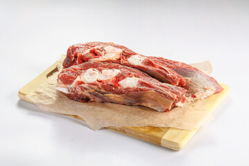 Raw bones for cooking over board