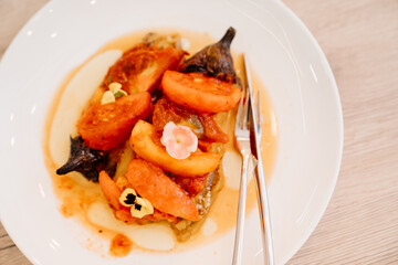 original serving of hot vegetable salad cooked on the grill. Catering. 