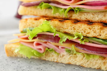 Tasty sandwiches on table, closeup