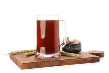 Mug of fresh kvass and yeast on white background