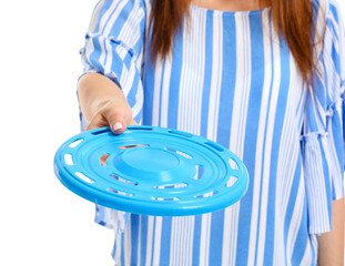 Beautiful young woman with frisbee disk on white background, closeup
