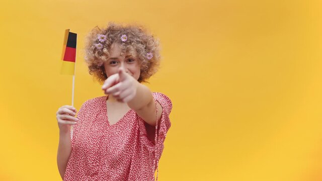 Girl Holding German Flag In Her Hand Learn German Concepts student exchange