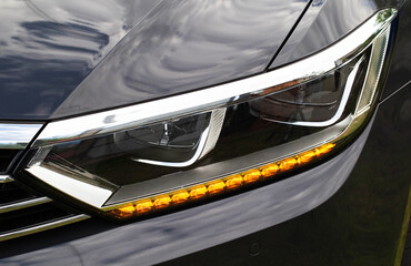 Economical and modern car headlight with LED adaptive light. Close-up, illuminate © HENADZY