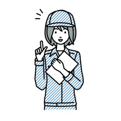立って書類を手に持って何かひらめいた作業員の女性