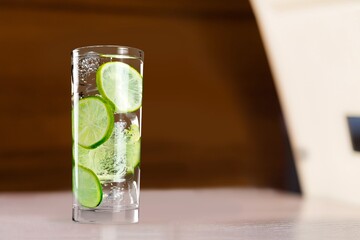 Mojito tasty fresh cocktail drink with fresh mint, lime juice, cane sugar and soda.