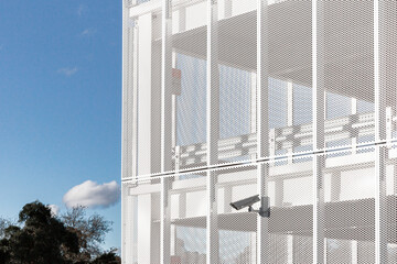 Surveillance camera on modern building.