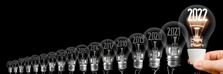 Light Bulbs with New Year 2022 - obrazy, fototapety, plakaty
