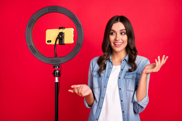 Portrait of attractive glamorous popular cheerful girl creating web blog talking isolated over...