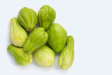 Fresh chayote fruit on white background.