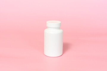 jar for vitamins or dietary supplements mockup pink background