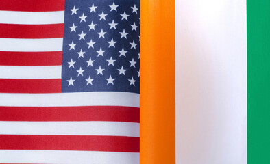 fragments of the national flags of the United States and the Republic of Ivory Coast close-up
