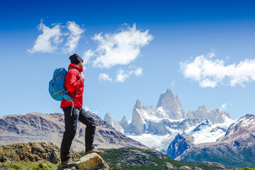 Fototapeta na wymiar Active man hiking in the mountains. Patagonia, Mount Fitz Roy. Mountaineering sport lifestyle concept