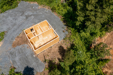 Aerial top view stages of construction houses wood build roof. New home framing