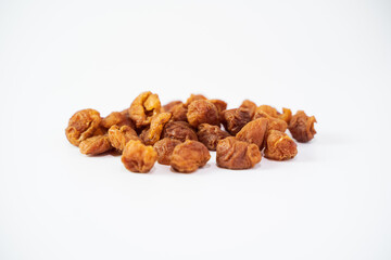 Dried longan isolated on white background. Dehydrated food isolated concept. 