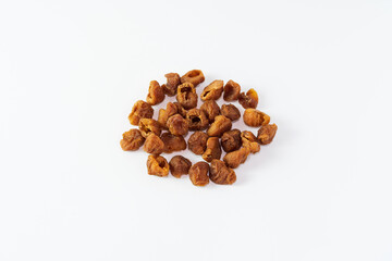 Dried longan isolated on white background. Dehydrated food isolated concept. 