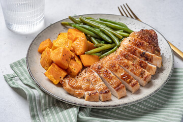 Grilled chicken breast, fillet with sweet potato or pumpkin and green beans, healthy food, top view