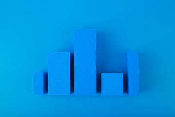 Creative business concept. Blue graph diagram or performance chart with rise and fall dynamic...