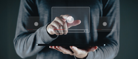 Man using tablet for watching video on internet, online streaming, online class, content creator