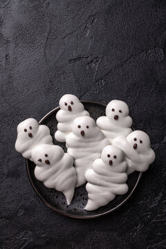 Funny and delicious meringue ghoast for halloween party decor