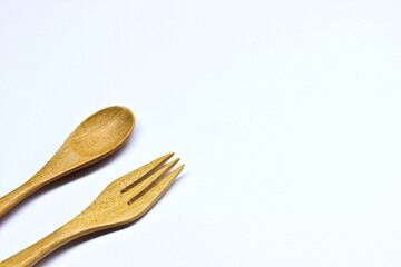 Wooden Spoon and Fork Isolated on the White Background