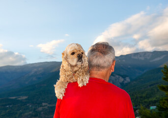 Senior man with american cocker spaniel