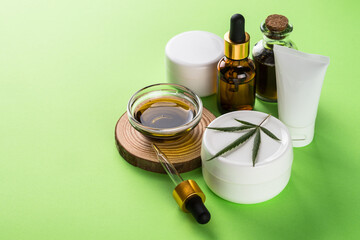 Cannabis cosmetic products. Natural cosmetic concept. Cream, soap, serum, essential oil and others.