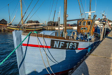 Denmark, Faaborg, 04-09-2021 old fishing cutter. in classic blue color, wooden wheelhouse © LeonHansenPhoto