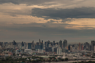 Fototapeta na wymiar Bangkok, thailand - May 11, 2020 : Sky view of Bangkok with skyscrapers in the business district in Bangkok in the evening beautiful twilight give the city a modern style. Selective focus.