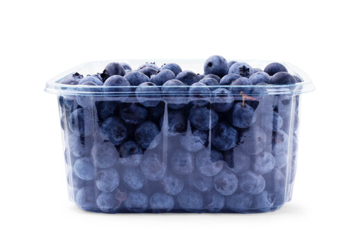 Fresh blueberries with bluberry leaves isolated on white background.