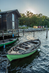 Fototapeta na wymiar Denmark, Middelfart, 04-09-2021- Old and new wooden dinghies, are moored