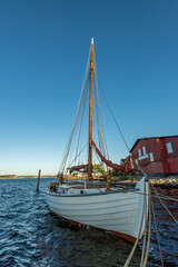 Denmark, Middelfart, 04-09-2021- Old and new wooden dinghies, are moored