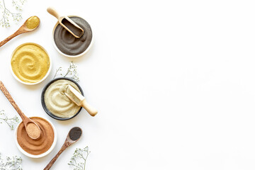 Clay for face and body care beauty treatment. Cosmetic mask, top view