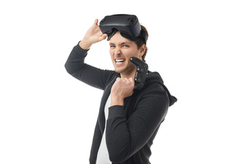 Excited gamer in VR headset with controller