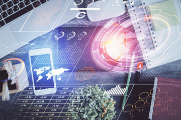 Double exposure of technology theme drawing over work table desktop. Top view. Global data analysis concept.