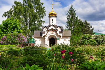 Chapel of the Descent of the Holy Spirit in the monastery of Boris and Gleb on a sunny, warm summer day. Dmitrov, Moscow Region, Russia-July 2021