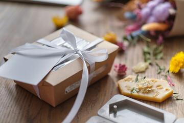 dried flowers, aromatic sachets made by hand. Autumn composition on a wooden table. Gift Box with,...