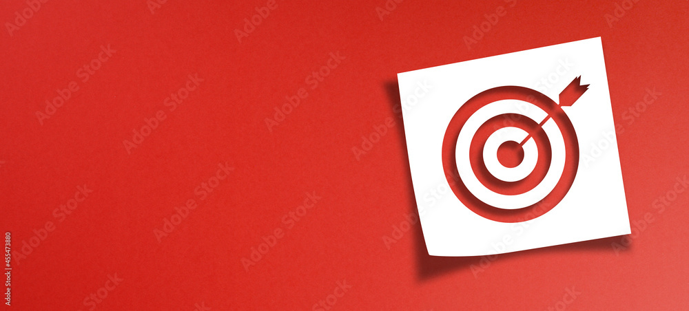 Poster note paper and target sign with copy space on panoramic red background