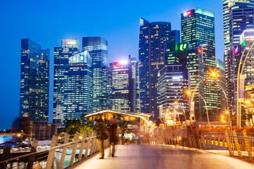 Fototapeta na wymiar SSINGAPORE, SINGAPORE - MARCH 2019: Vibrant Singapore skyline at night