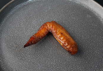 bbq grilled honey golden chicken wing on dark grey wood background fast food halal menu