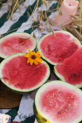 Summer picnic fruit and bread on a blanket in the