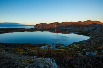 Fototapeta na wymiar Autumn sunset and landscape in Nordkapp. northern Norway