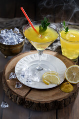 Refreshing summer alcoholic cocktail with crushed ice and citrus fruits