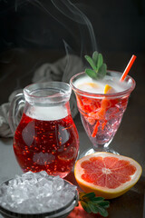 Refreshing summer alcoholic cocktail with crushed ice and citrus fruits