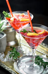 Refreshing summer alcoholic cocktail with crushed ice and citrus fruits