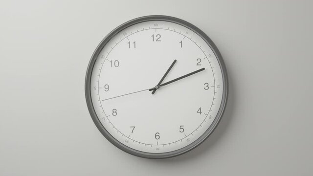 Clock Face on White Office Wall in Timelapse