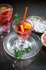 Glasses of wine on a black background.