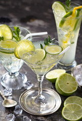 Fruit cocktail, in a glass with natural healthy fruits on a table with kitchen accessories.