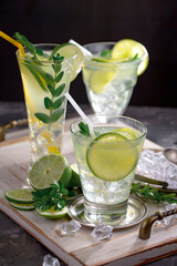 Fruit cocktail, in a glass with natural healthy fruits on a table with kitchen accessories.