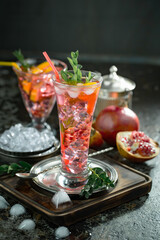 Glasses of wine on a black background.